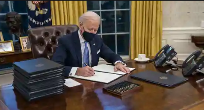 On Day 1, Joe Biden signs 15 executive orders, reversing Donald Trump’s key policies